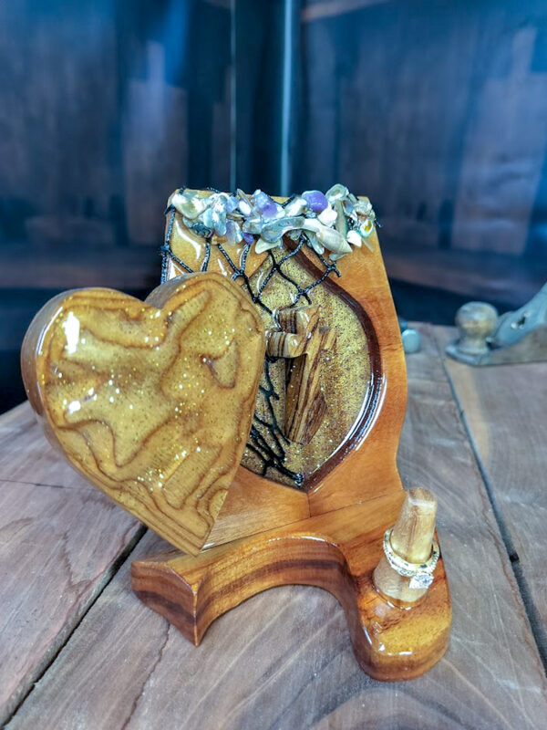 Luxury wooden wedding ring holder with cross and heart design, handmade by artisan KS Marsau at Luxe Ring Haven. Makes a unique Gift for Bride from Groom.