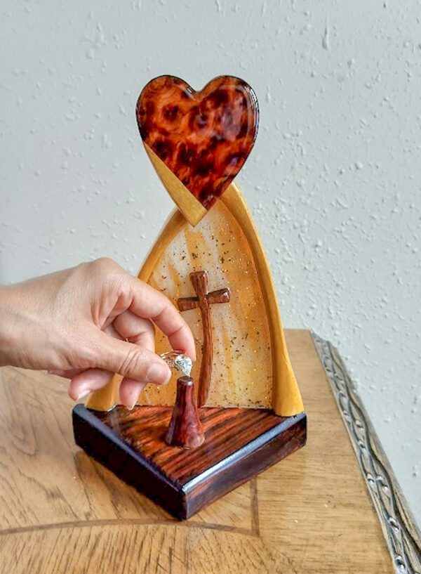 Luxury wooden wedding ring holder with cross and heart design, handmade by artisan KS Marsau at Luxe Ring Haven. Makes a unique Gift for Bride from Groom.