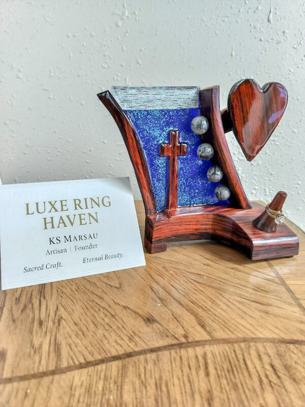 Luxury wooden wedding ring holder with cross and heart design, handmade by artisan KS Marsau at Luxe Ring Haven. Makes a unique Gift for Bride from Groom.