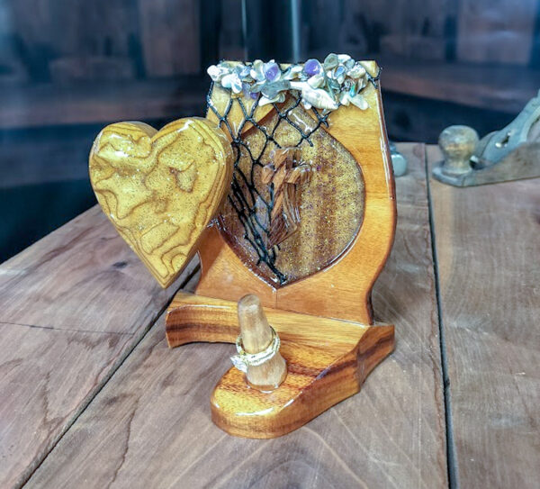 Luxury wooden wedding ring holder with cross and heart design, handmade by artisan KS Marsau at Luxe Ring Haven. Makes a unique Gift for Bride from Groom.