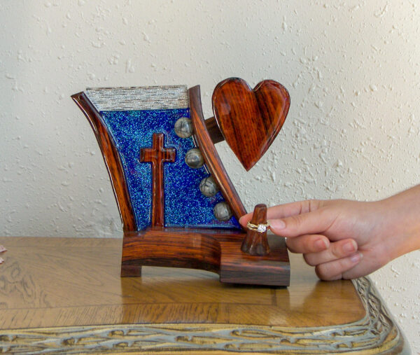 "Heaven's Radiance – Sapphire Light Ring Holder with Cross and Heart" - Image 2