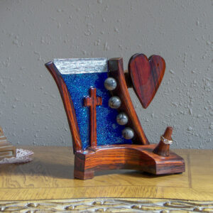 "Heaven's Radiance – Sapphire Light Ring Holder with Cross and Heart"