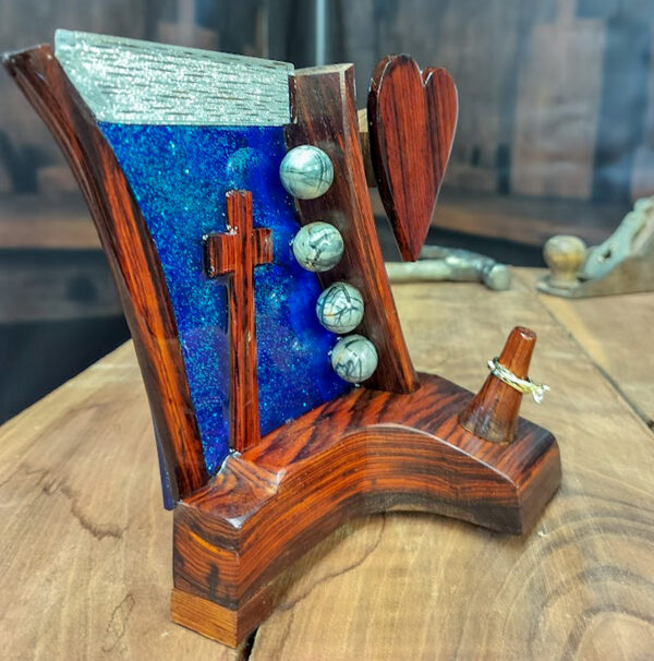 Luxury wooden wedding ring holder with cross and heart design, handmade by artisan KS Marsau at Luxe Ring Haven. Makes a unique Gift for Bride from Groom.