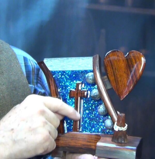 "Heaven's Radiance – Sapphire Light Ring Holder with Cross and Heart" - Image 9