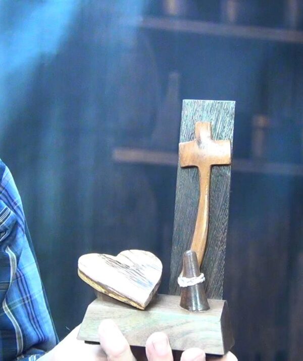 Luxury wooden wedding ring holder with cross and heart design, handmade by artisan KS Marsau at Luxe Ring Haven. Makes a unique Gift for Bride from Groom.