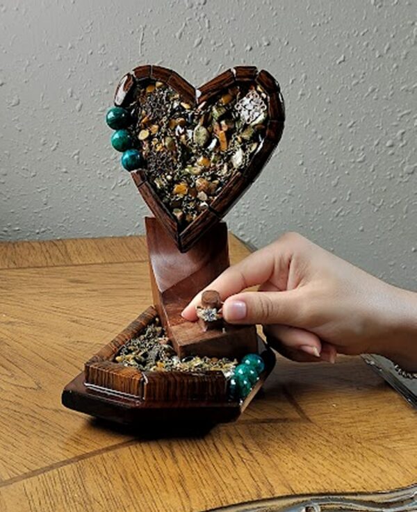 Luxury wooden wedding ring holder with cross and heart design, handmade by artisan KS Marsau at Luxe Ring Haven. Makes a unique Gift for Bride from Groom.