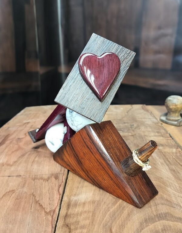 Luxury wooden wedding ring holder with cross and heart design, handmade by artisan KS Marsau at Luxe Ring Haven. Makes a unique Gift for Bride from Groom.