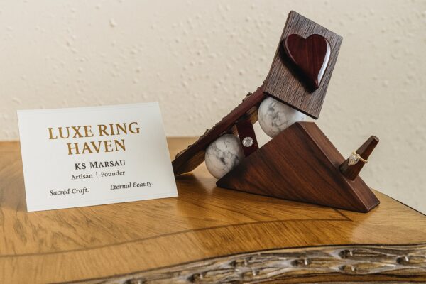 Luxury wooden wedding ring holder with cross and heart design, handmade by artisan KS Marsau at Luxe Ring Haven. Makes a unique Gift for Bride from Groom.