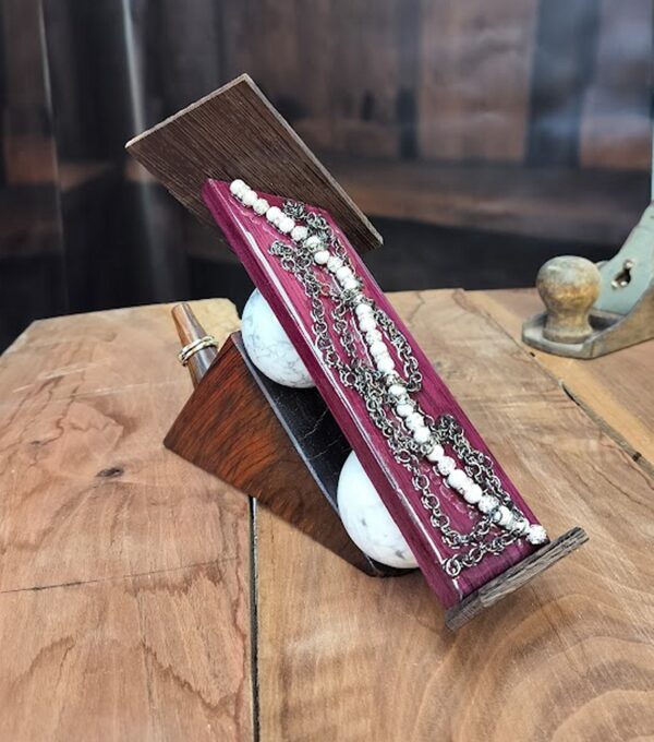 Luxury wooden wedding ring holder with cross and heart design, handmade by artisan KS Marsau at Luxe Ring Haven. Makes a unique Gift for Bride from Groom.